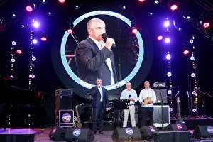 Head of the Republic of Crimea Sergei Aksyonov, Chairman of the Koktebel Jazz Party (KJP) Organizing Committee and Director General of Rossiya Segodnya Dmitry Kiselev, and TV host Ernest Mackevicius (from left to right) at the 17th Koktebel Jazz Party 2019 International Jazz Festival