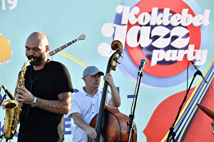 Famous saxophonist and founder of the SG BIG BAND Sergei Golovnya (left) performing at the 17th Koktebel Jazz Party international festival